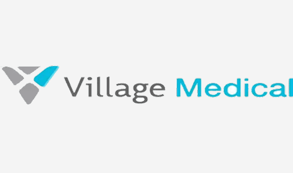 Logo featuring the text 'Village Med' with a clean and modern font.