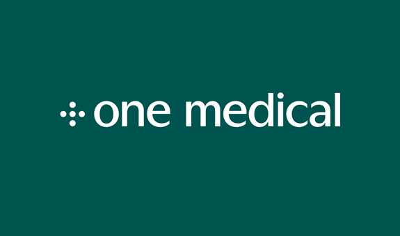 Logo of One Medical in white text on a dark teal background.